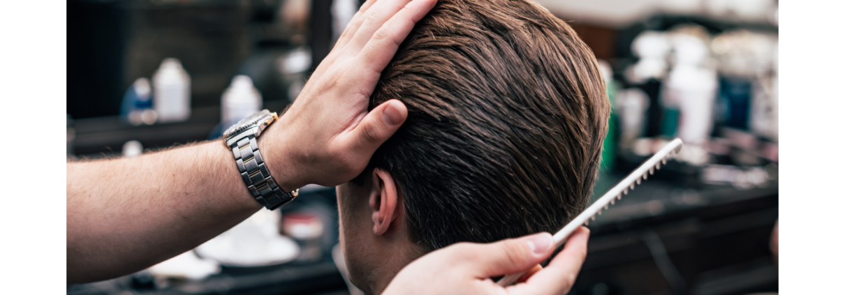 men's combing hair wax product into hair